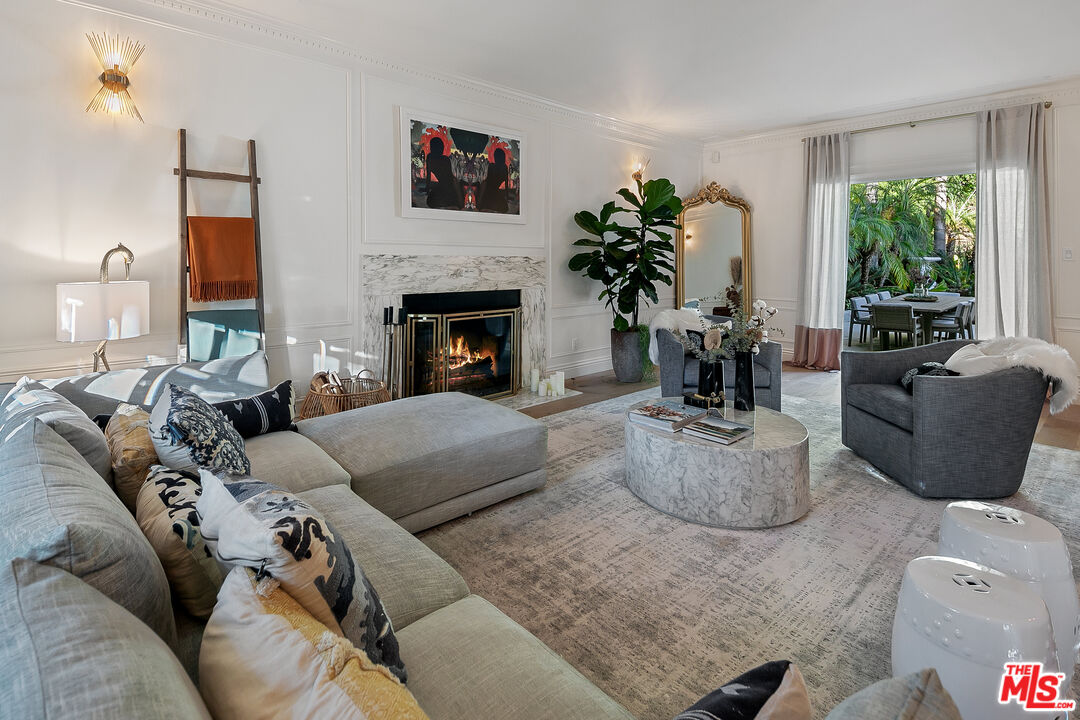 3228 Berry Drive Studio City, CA 91604 - Photo 8 of 40 a living room with furniture and a fireplace