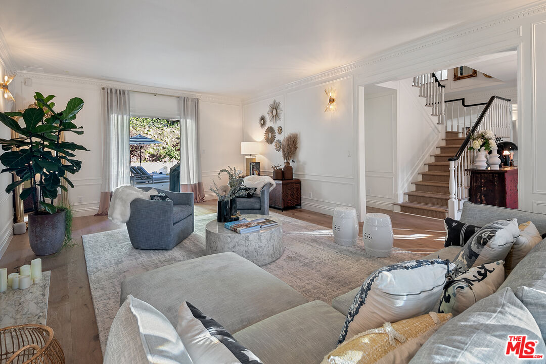 3228 Berry Drive Studio City, CA 91604 - Photo 9 of 40 a living room with furniture potted plant and a window