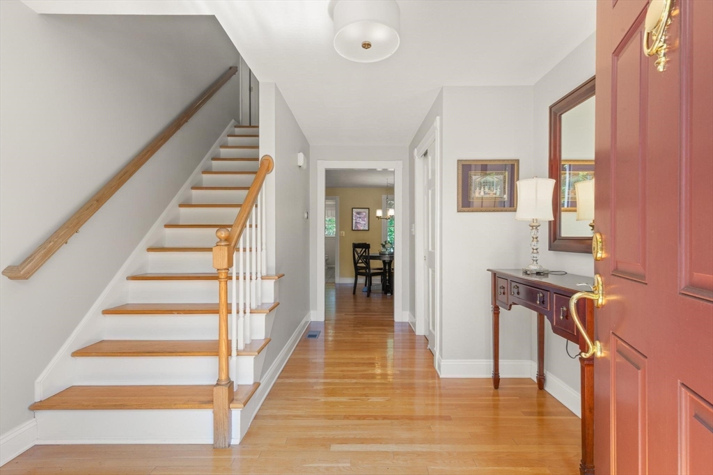 67 Bridle Path Franklin, MA 02038 - Photo 5 of 35 a view of entryway and hall with wooden floor