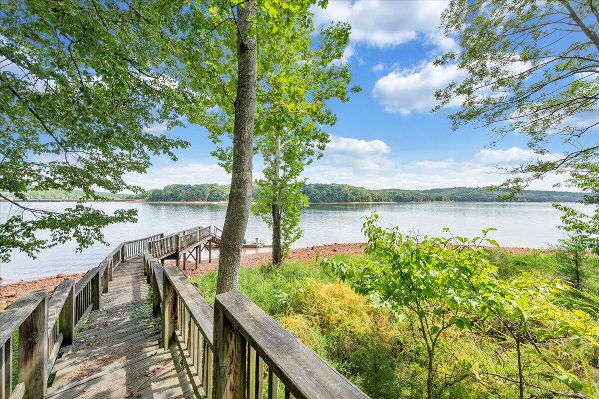 932 Clear Pointe Run Lynch Station, VA 24571 - Photo 103 of 154 a view of a lake with a mountain in the background