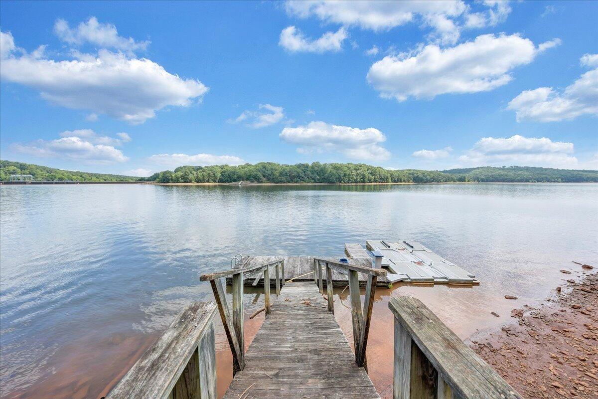 932 Clear Pointe Run Lynch Station, VA 24571 - Photo 107 of 154 a view of a lake with houses in the back