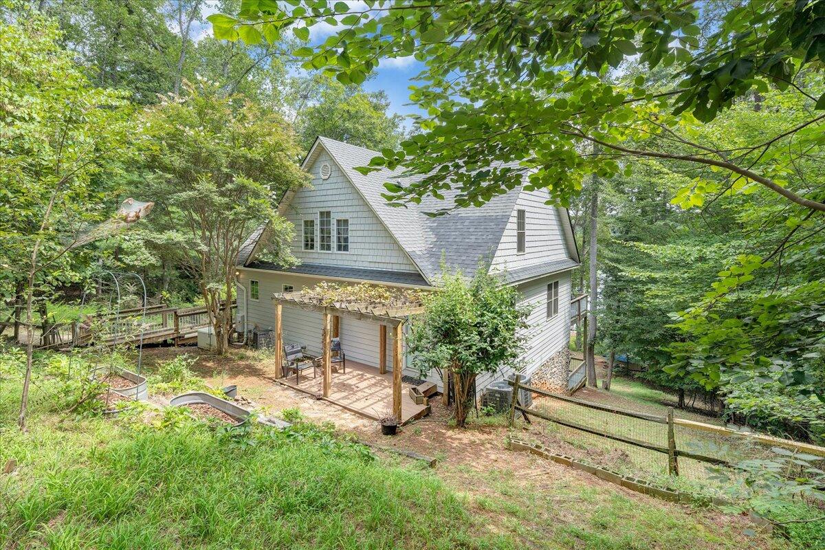 932 Clear Pointe Run Lynch Station, VA 24571 - Photo 113 of 154 a view of a house with a yard and sitting area
