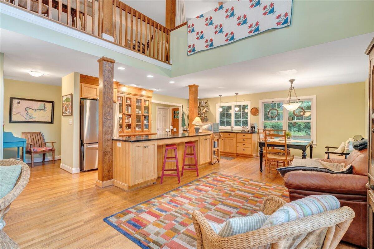 932 Clear Pointe Run Lynch Station, VA 24571 - Photo 15 of 154 a living room with furniture and kitchen view