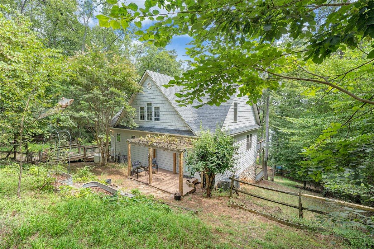 932 Clear Pointe Run Lynch Station, VA 24571 - Photo 2 of 154 a view of a house with a yard and sitting area