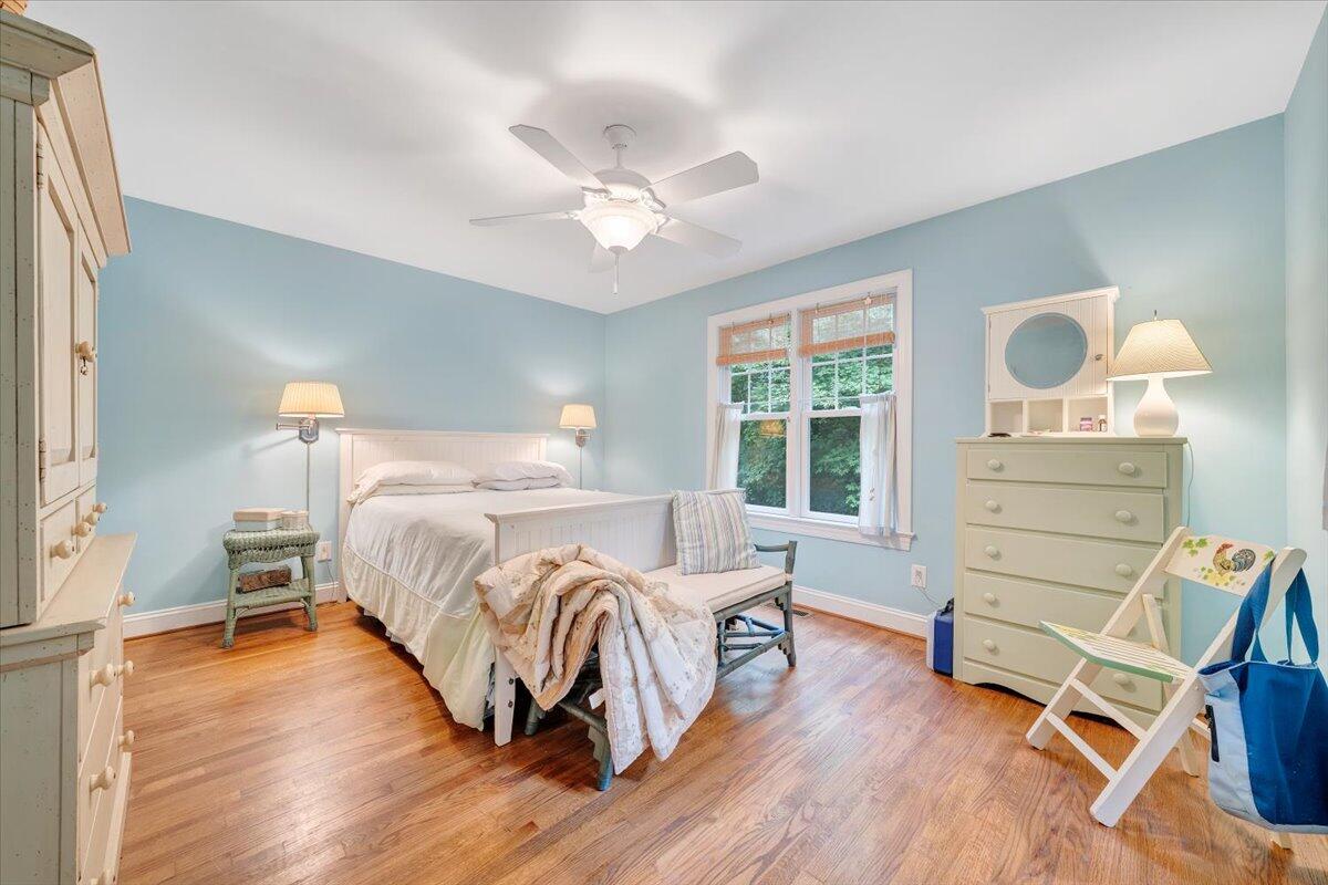 932 Clear Pointe Run Lynch Station, VA 24571 - Photo 31 of 154 a bed room with a bed and a chair