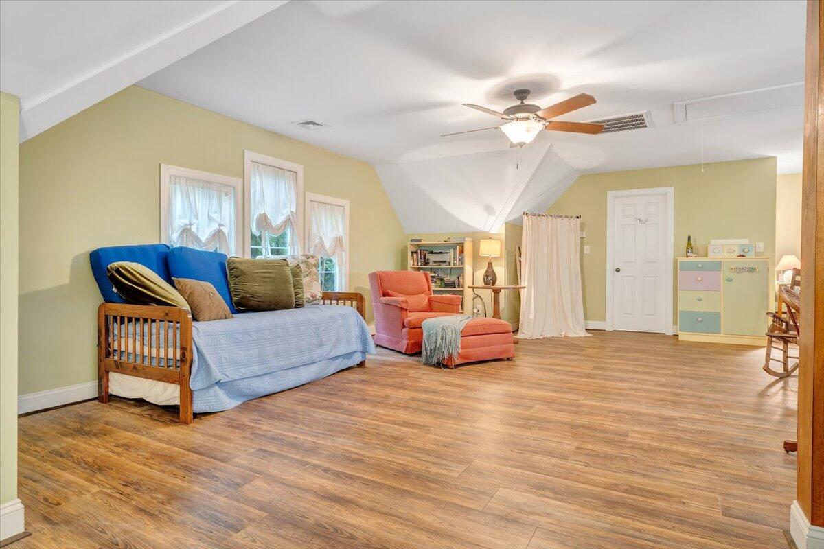 932 Clear Pointe Run Lynch Station, VA 24571 - Photo 36 of 154 a living room with furniture and a wooden floor