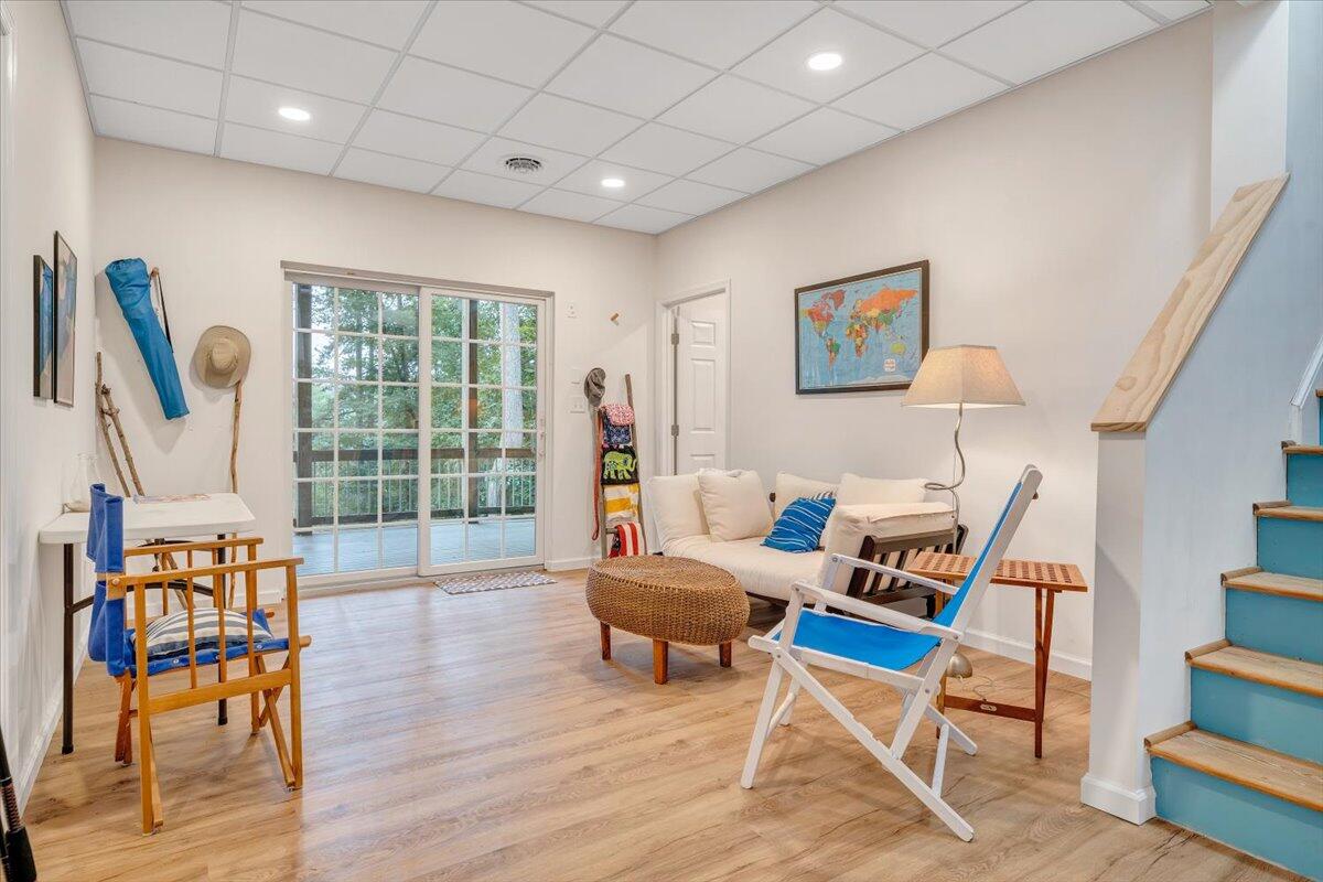 932 Clear Pointe Run Lynch Station, VA 24571 - Photo 49 of 154 a living room with furniture and a floor to ceiling window