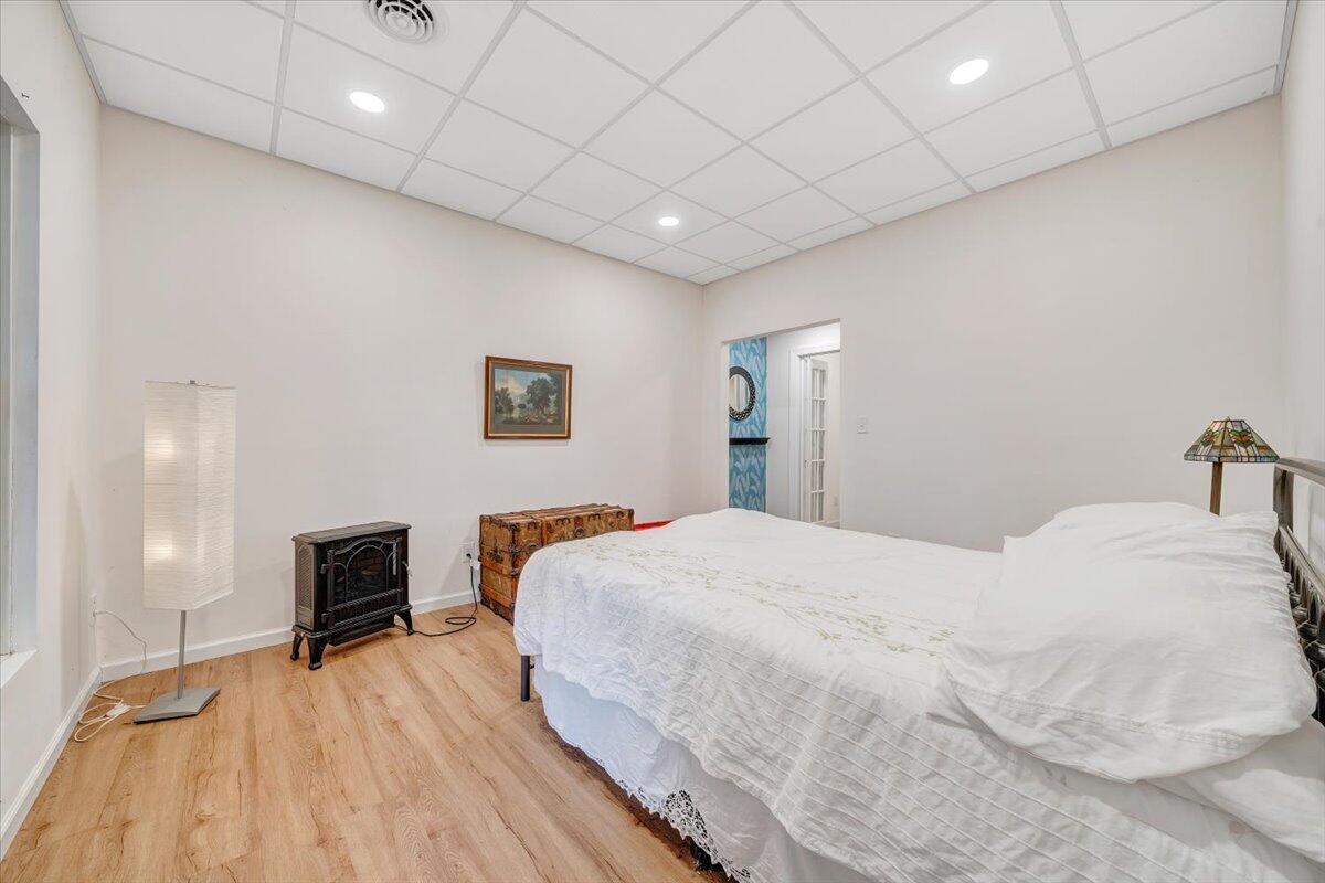 932 Clear Pointe Run Lynch Station, VA 24571 - Photo 52 of 154 a bedroom with a bed and a flat screen tv