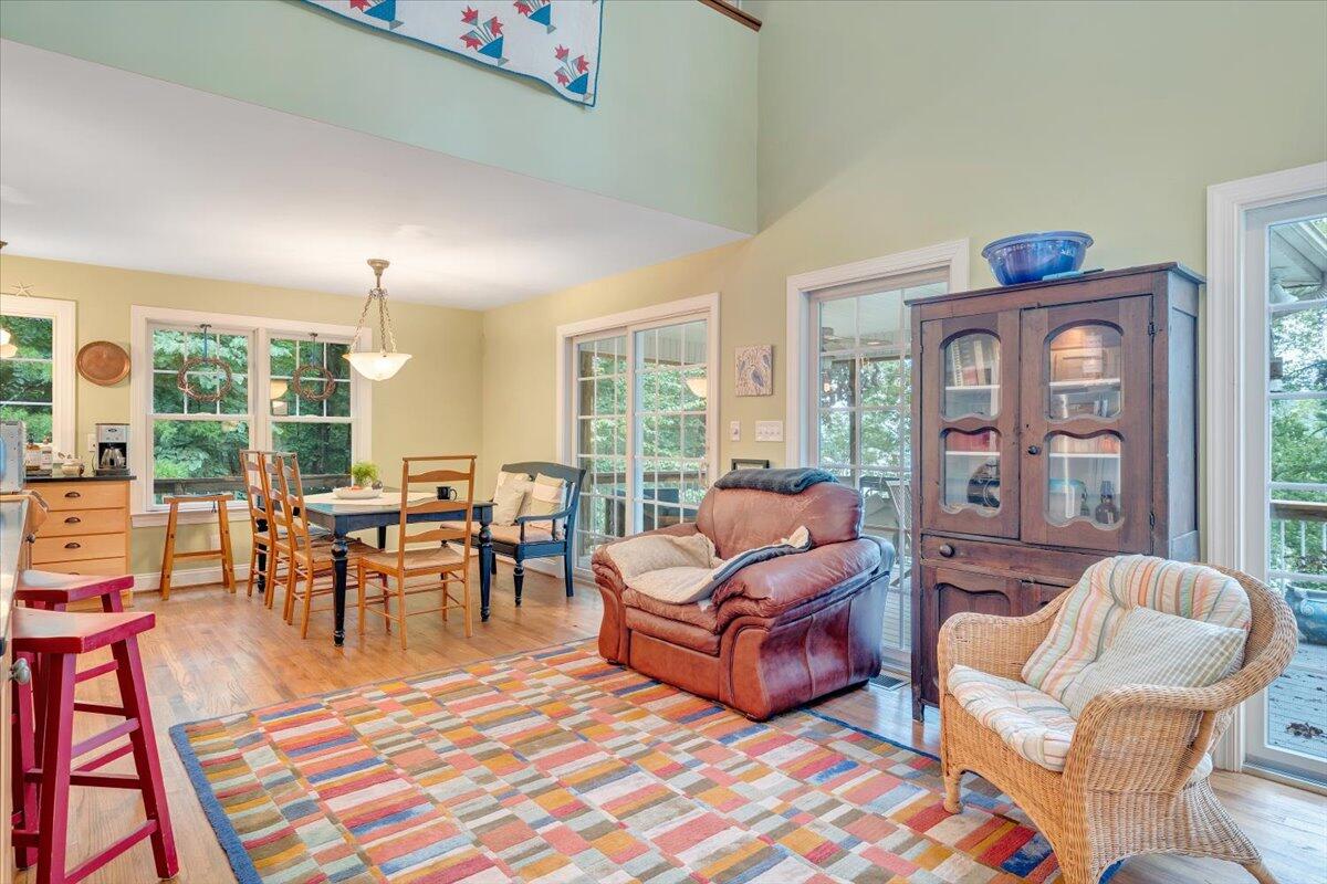932 Clear Pointe Run Lynch Station, VA 24571 - Photo 60 of 154 a living room with furniture fireplace and a large window