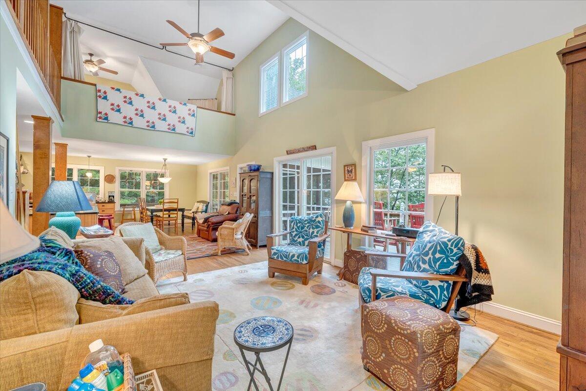 932 Clear Pointe Run Lynch Station, VA 24571 - Photo 62 of 154 a living room with furniture and a large window