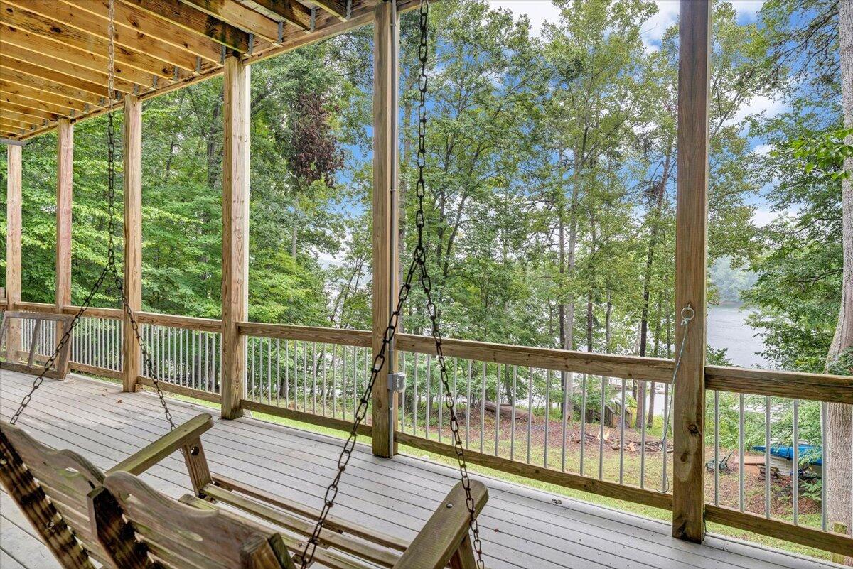 932 Clear Pointe Run Lynch Station, VA 24571 - Photo 73 of 154 a view of a balcony with chairs and wooden floor