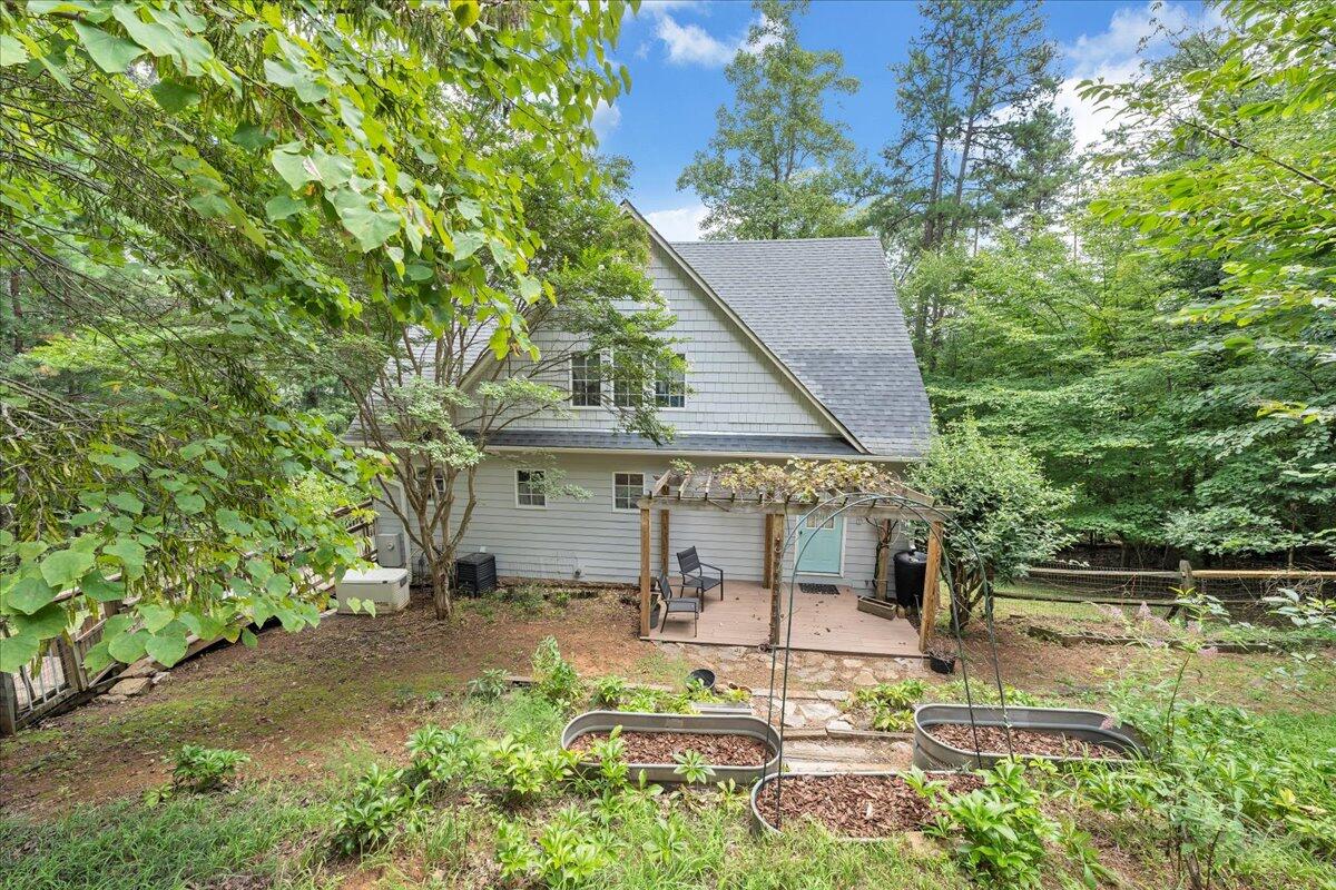 932 Clear Pointe Run Lynch Station, VA 24571 - Photo 94 of 154 a view of a house with backyard and sitting area