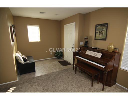 628 Monument Point Street Henderson, NV 89002 - Photo 17 of 25 Living Room.