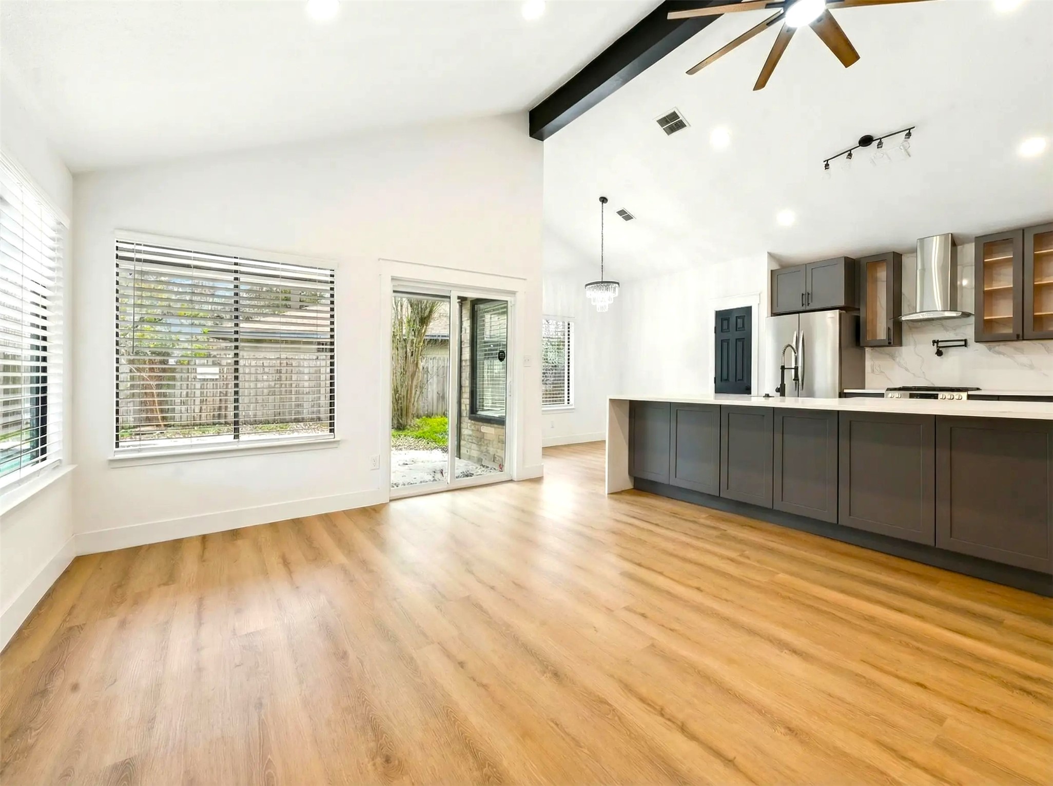 17307 Eden Court Spring, TX 77379 - Photo 13 of 43 a view of kitchen and hall with wooden floor