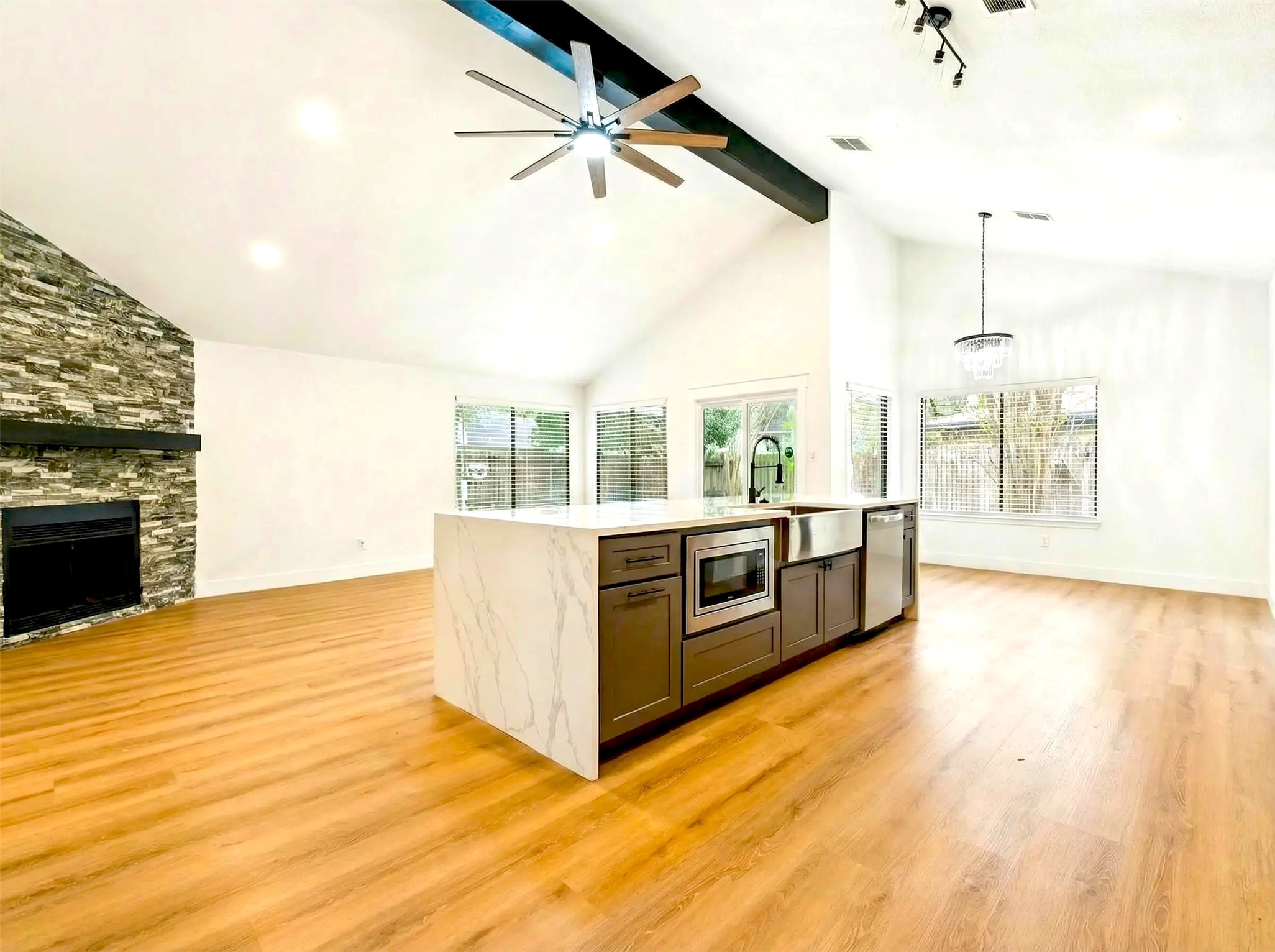 17307 Eden Court Spring, TX 77379 - Photo 16 of 43 a view of a living room with furniture and kitchen view