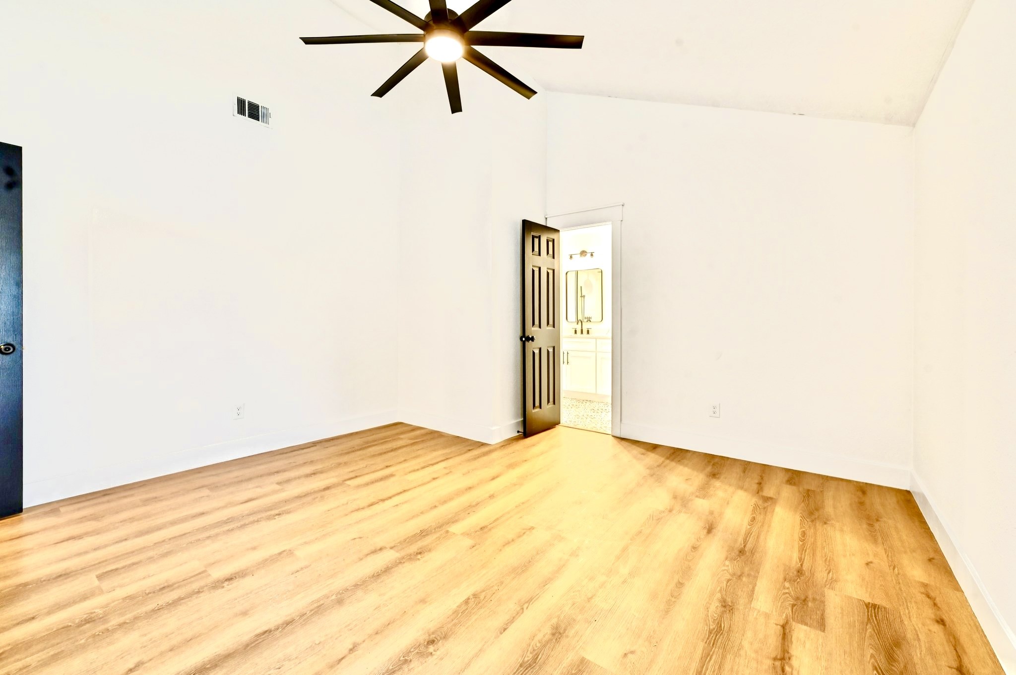 17307 Eden Court Spring, TX 77379 - Photo 23 of 43 a view of a big room with wooden floor and closet