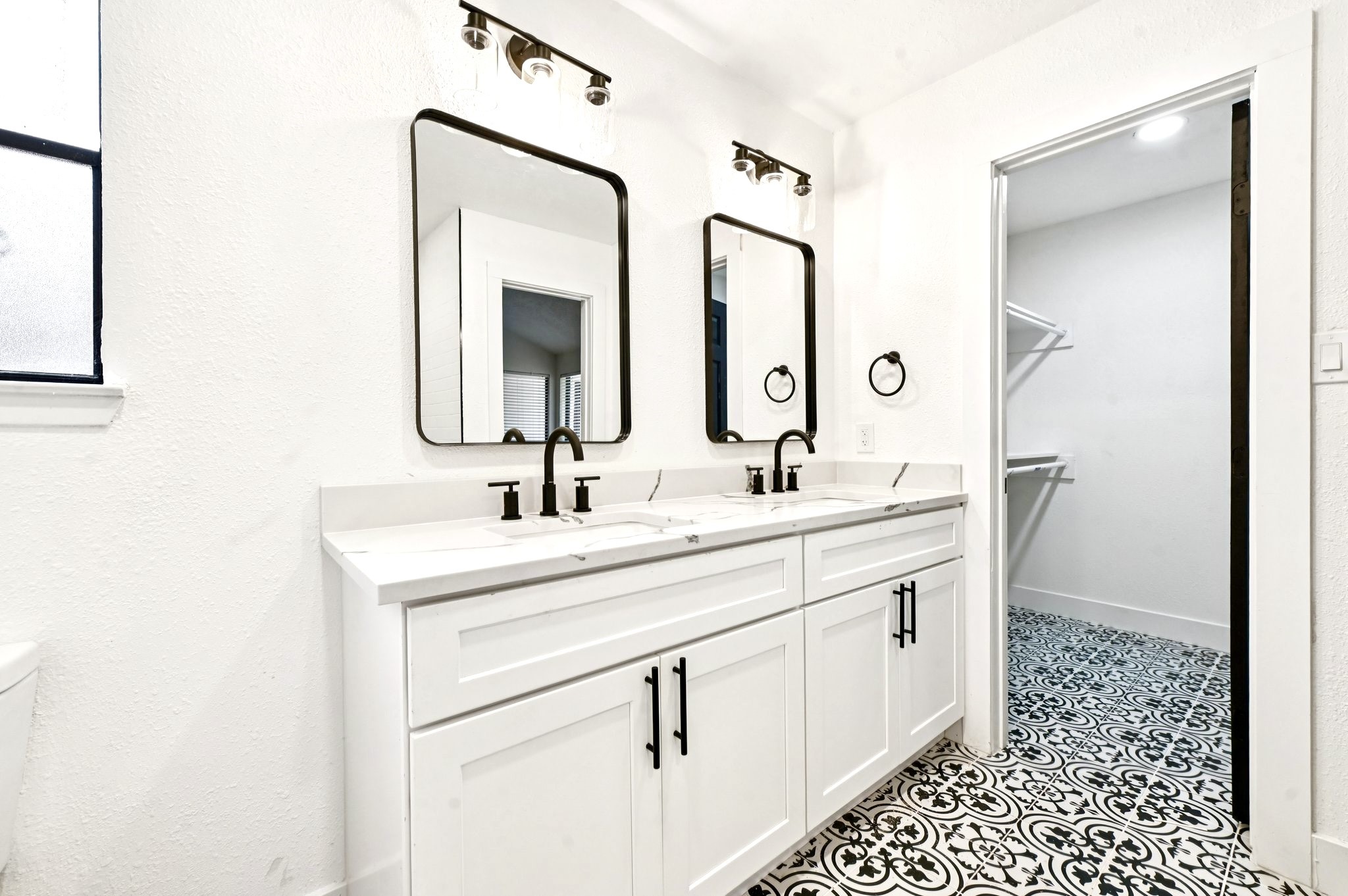 17307 Eden Court Spring, TX 77379 - Photo 26 of 43 a bathroom with a double vanity sink mirror and