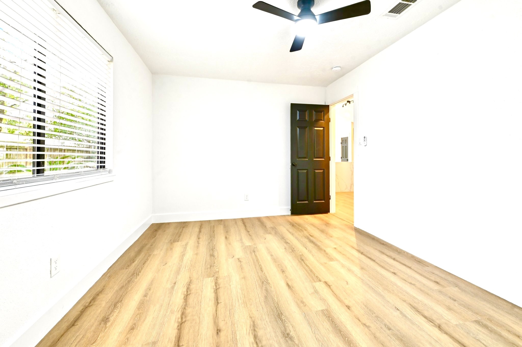 17307 Eden Court Spring, TX 77379 - Photo 30 of 43 a view of an empty room with wooden floor