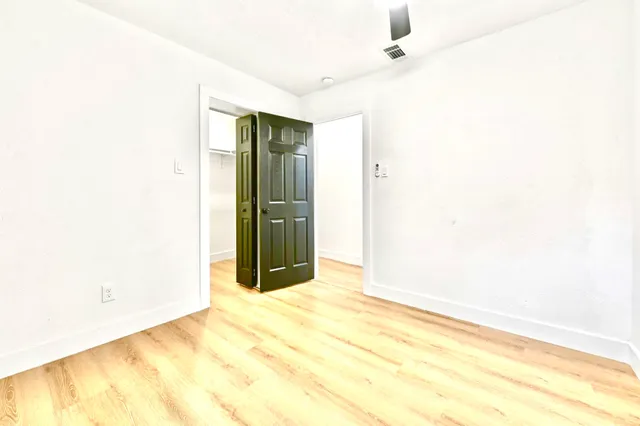 a view of a room with a window