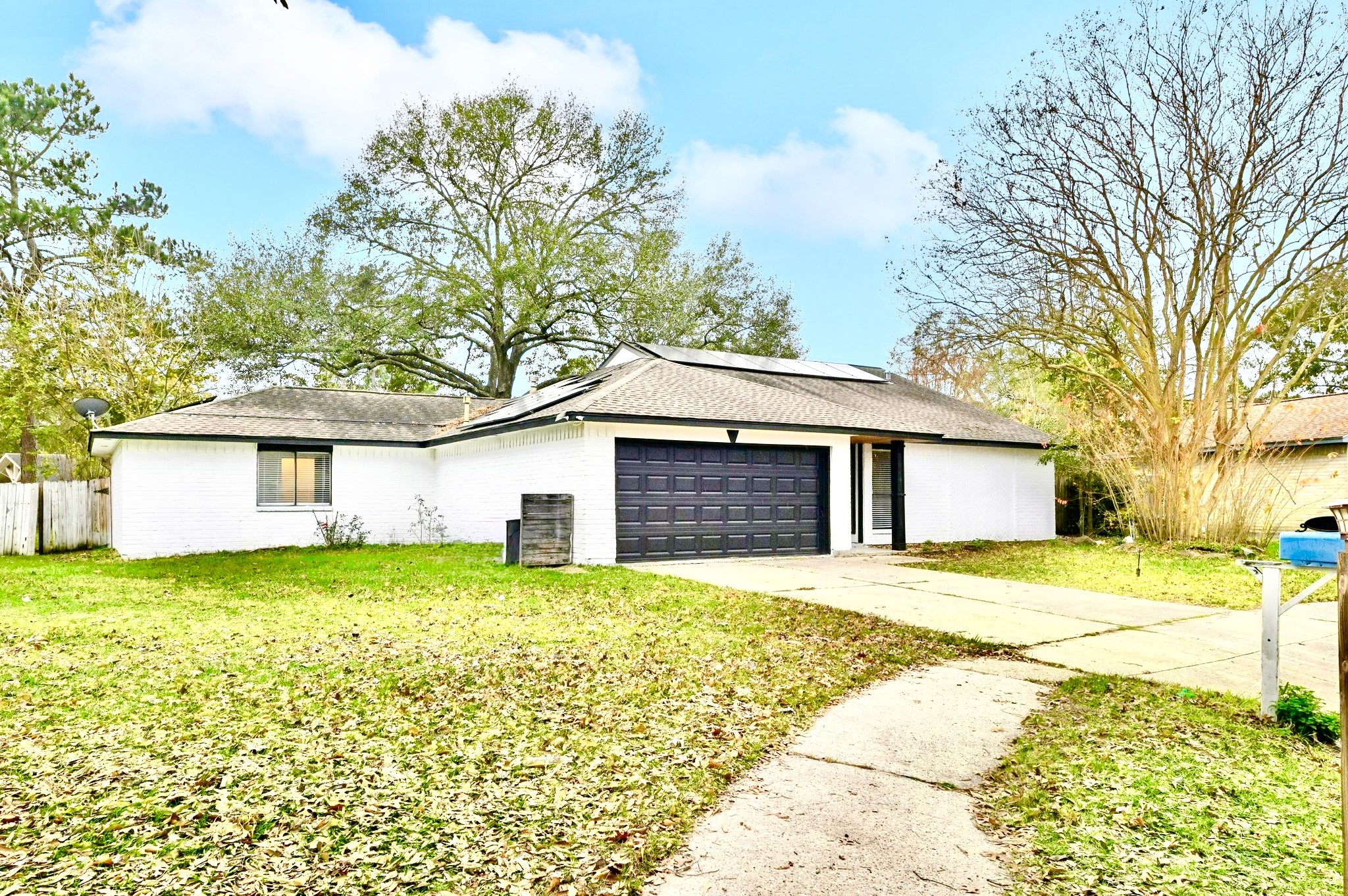17307 Eden Court Spring, TX 77379 - Photo 4 of 43 a house that has a big yard with large trees