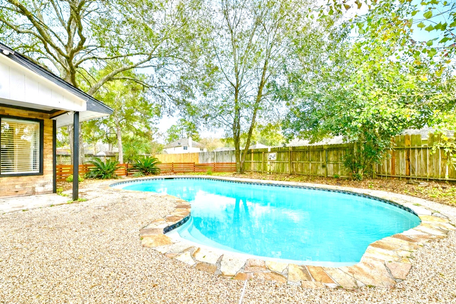 17307 Eden Court Spring, TX 77379 - Photo 41 of 43 a swimming pool with an outdoor space and seating area