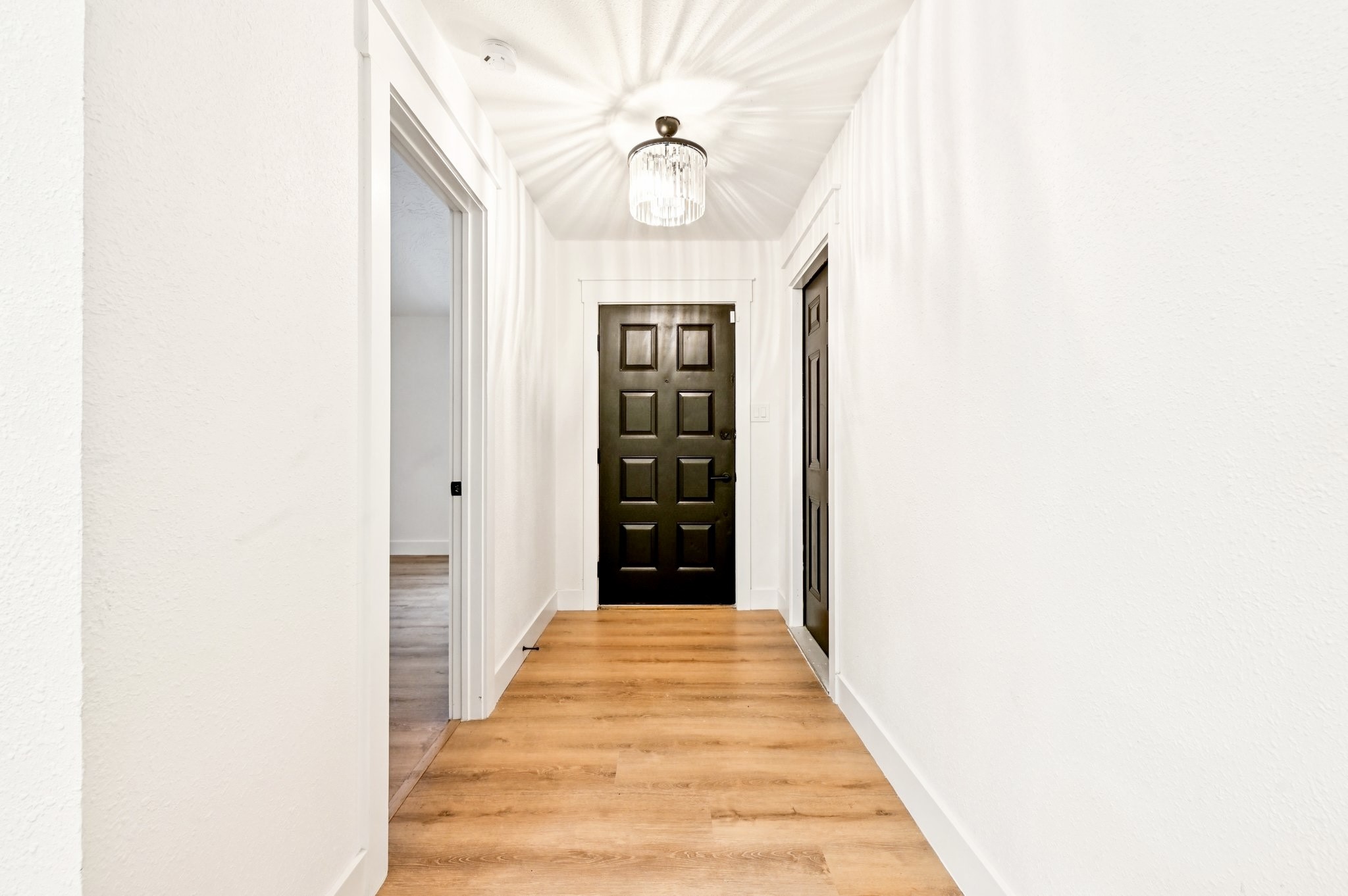 17307 Eden Court Spring, TX 77379 - Photo 8 of 43 a view of a hallway with a white walls