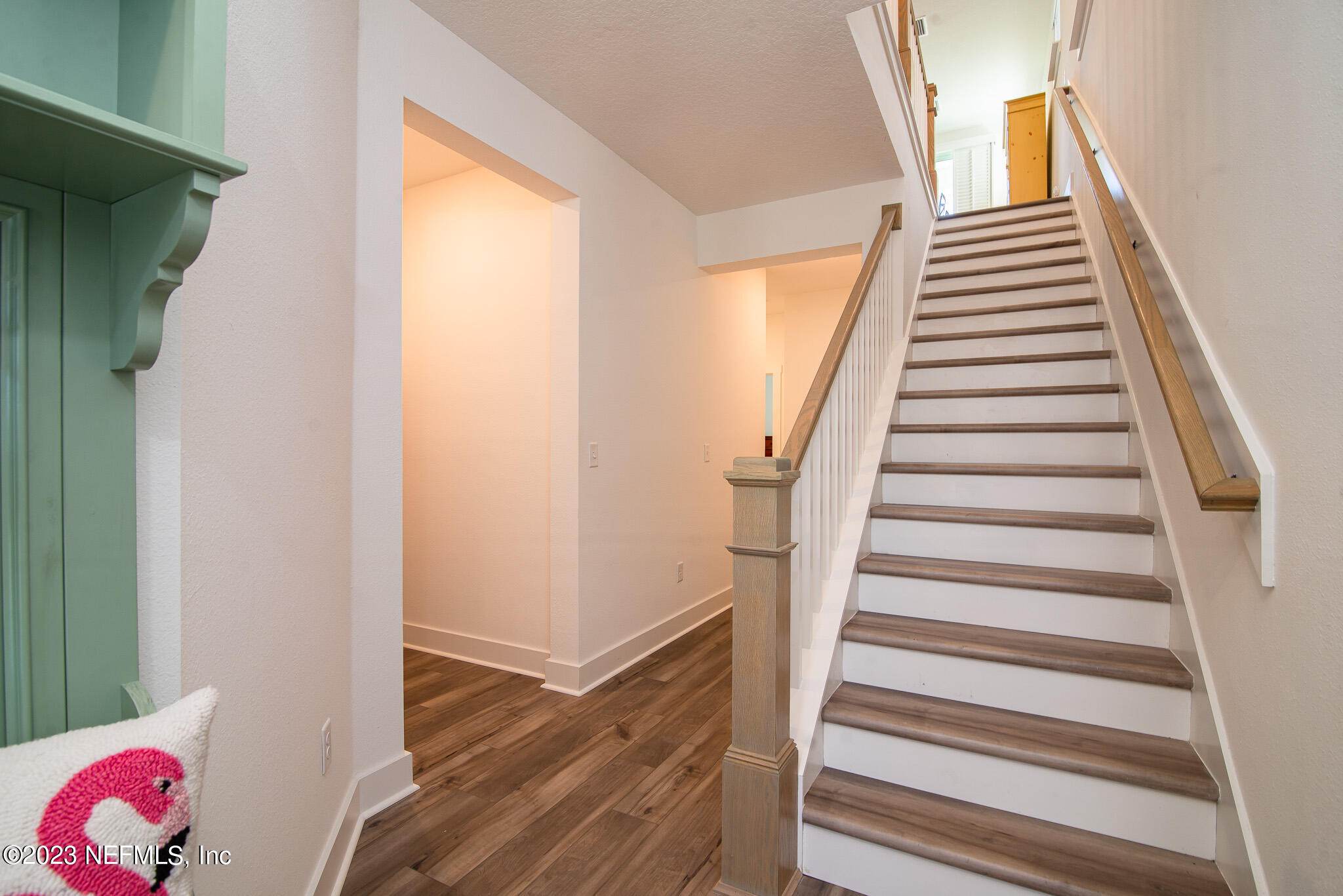 9868 Element Road Jacksonville, FL 32256 - Photo 21 of 36 a view of entryway and gallery with wooden floor