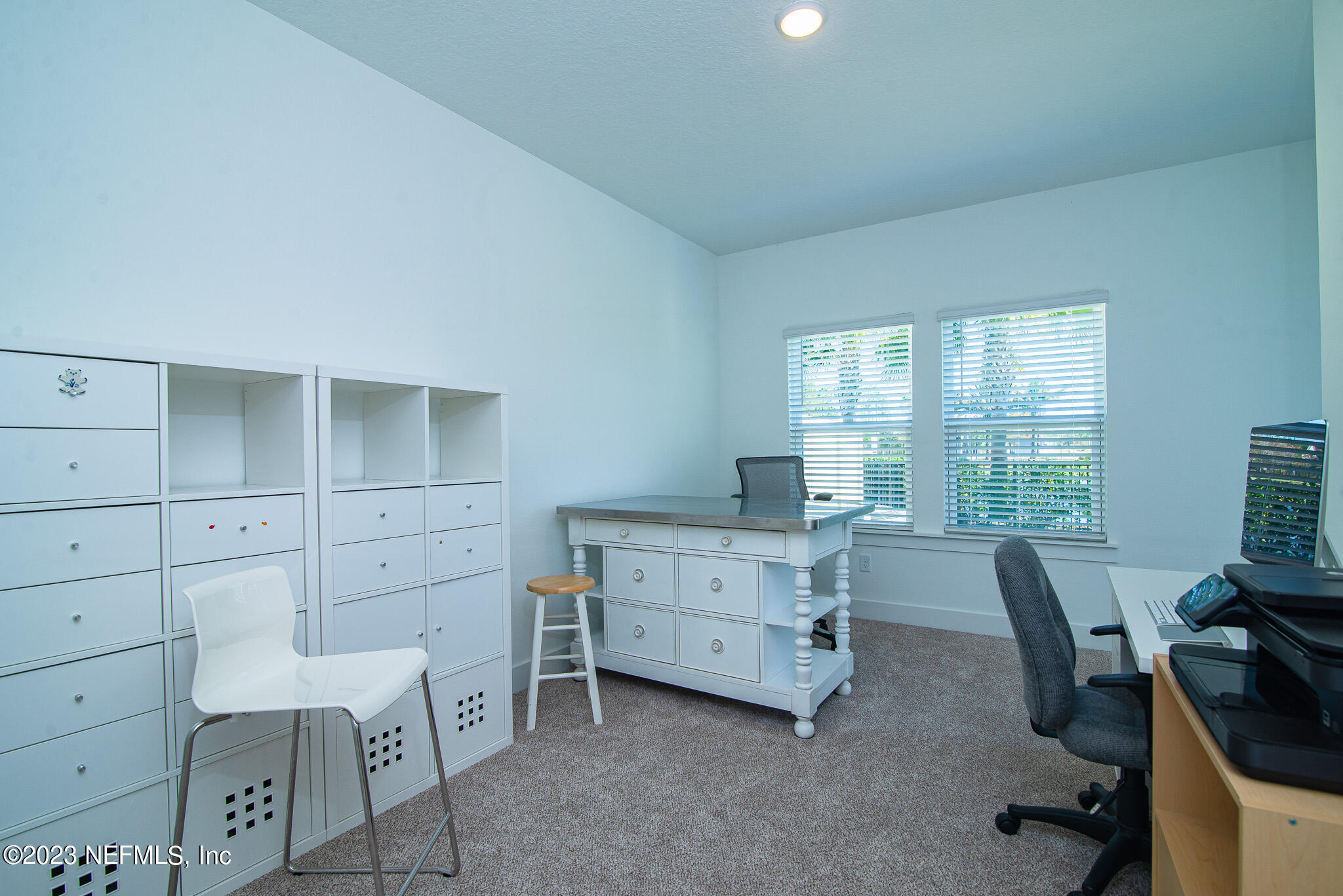 9868 Element Road Jacksonville, FL 32256 - Photo 24 of 36 a view of a workspace with furniture