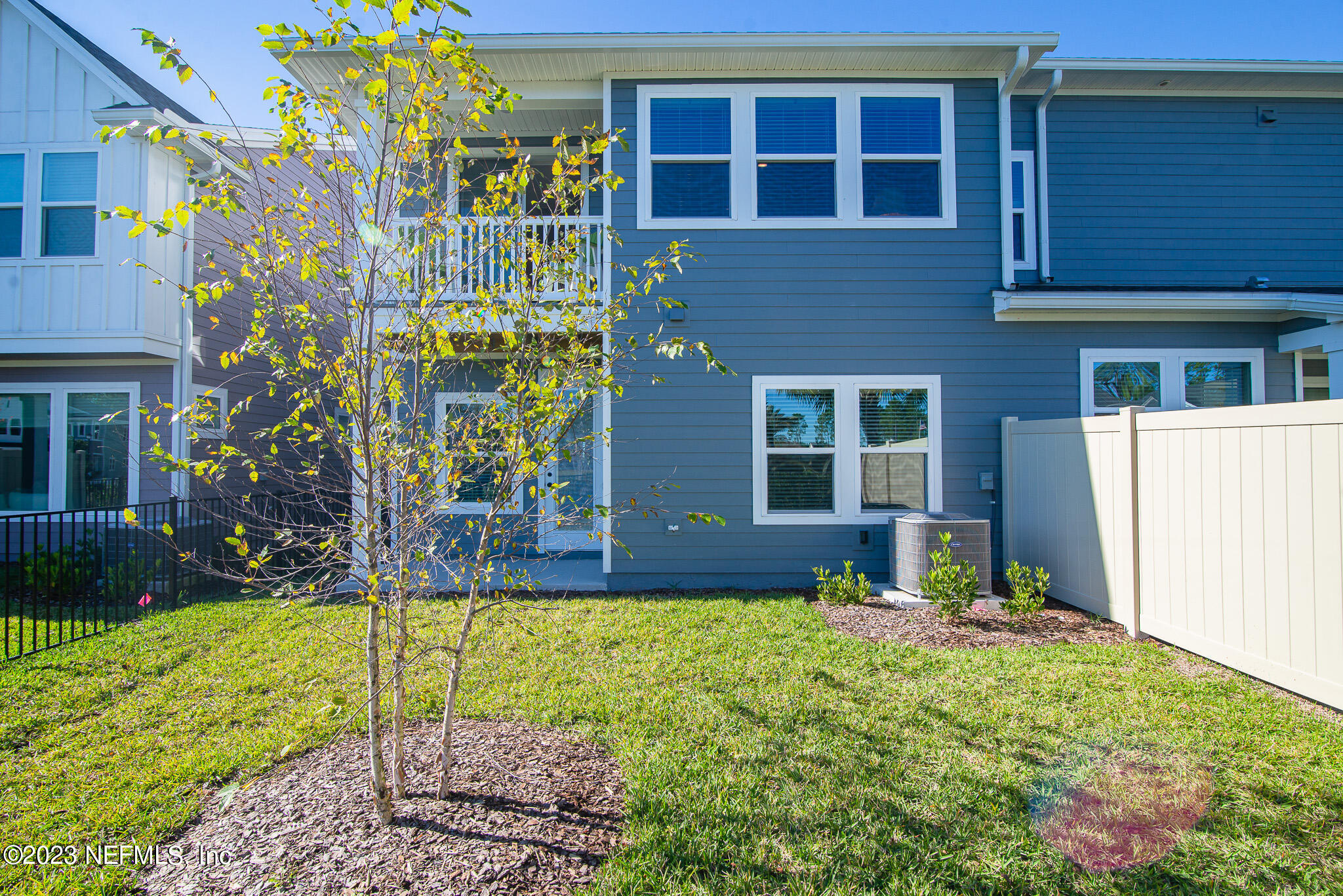 9868 Element Road Jacksonville, FL 32256 - Photo 31 of 36 a house view with a garden space