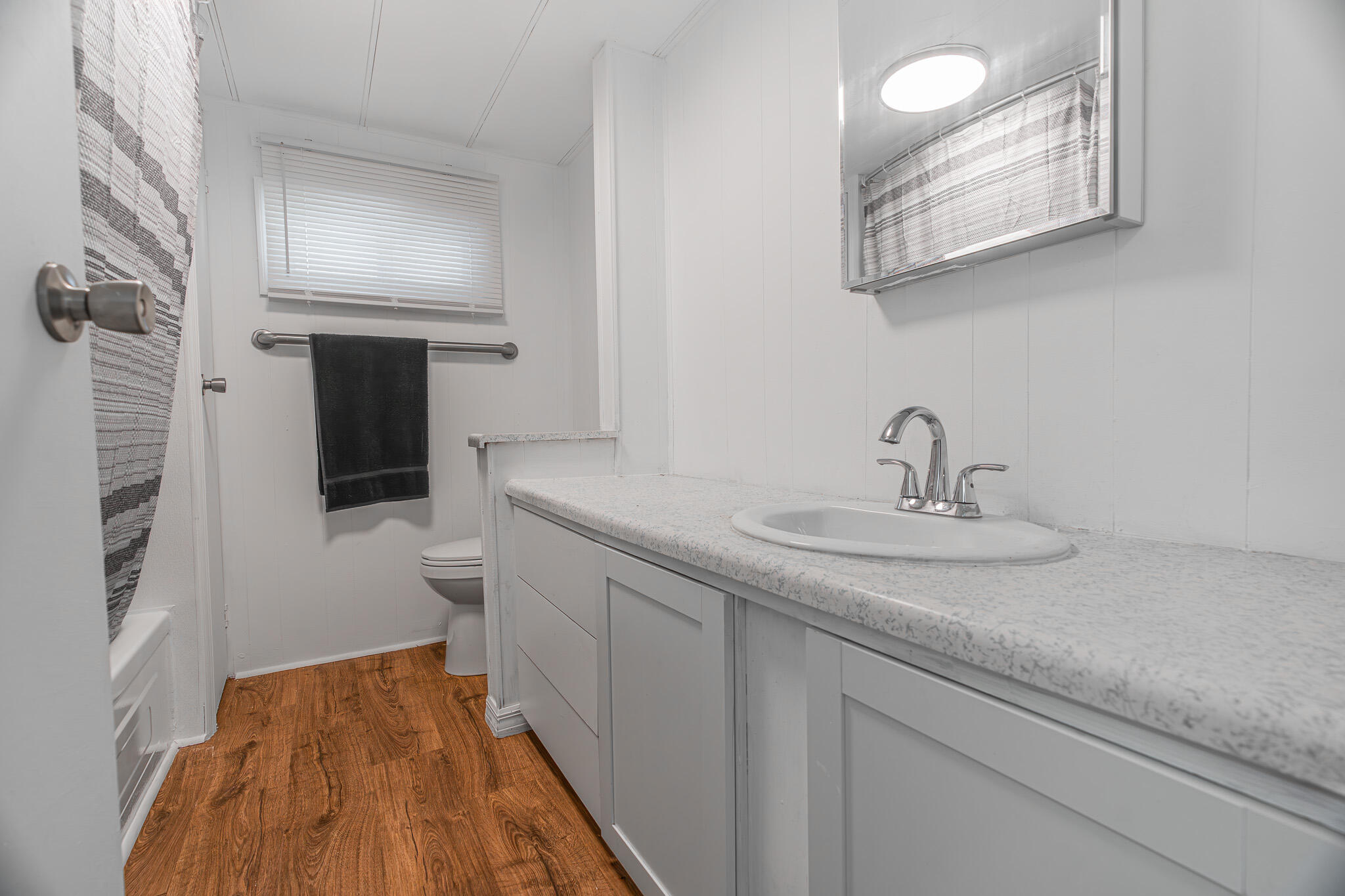 2531 Chatham Way Northeast Palm Bay, FL 32905 - Photo 18 of 28 a bathroom with a sink and a mirror