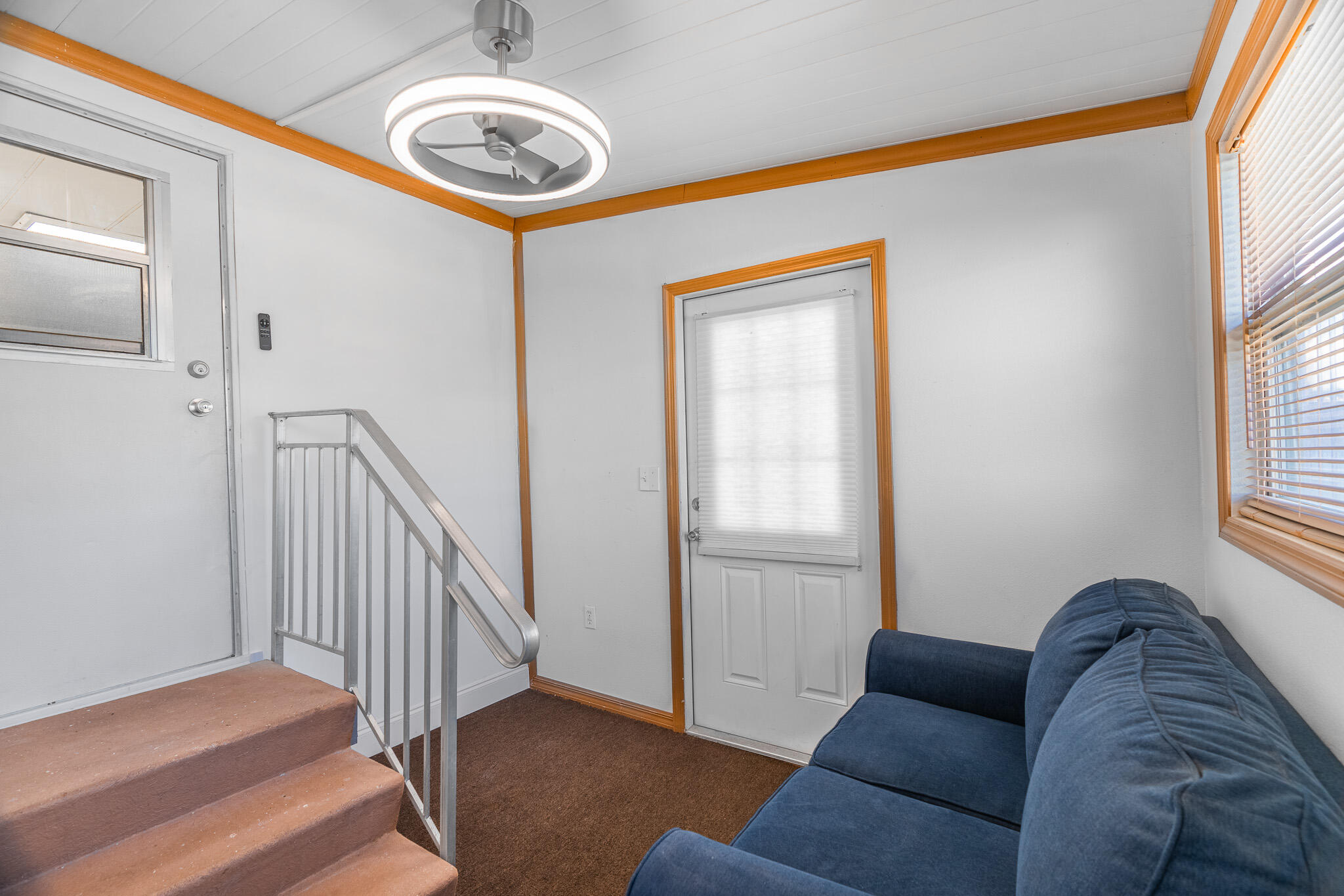 2531 Chatham Way Northeast Palm Bay, FL 32905 - Photo 19 of 28 a living room with furniture and a window