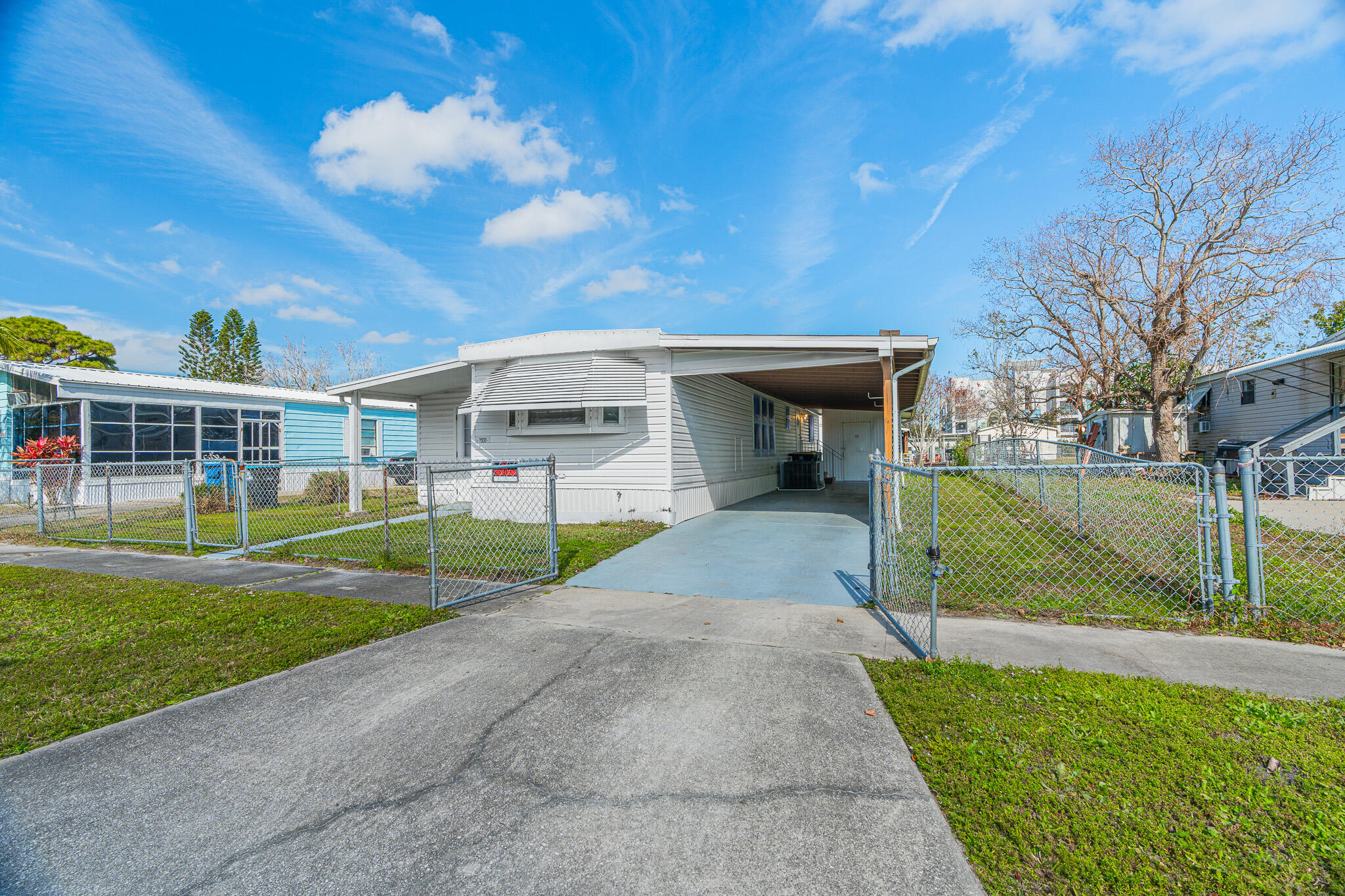 2531 Chatham Way Northeast Palm Bay, FL 32905 - Photo 24 of 28 a view of a house with a yard