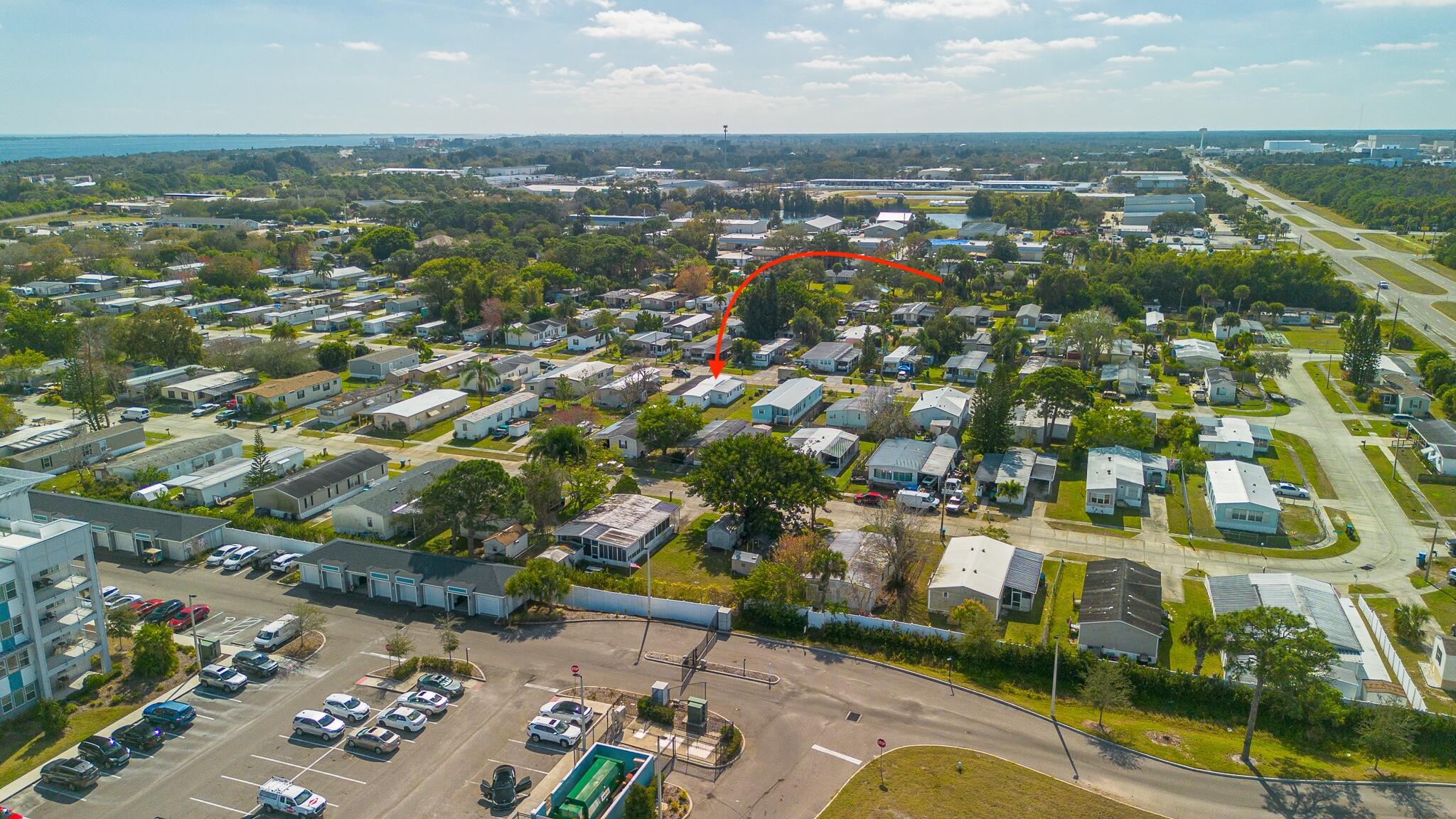 2531 Chatham Way Northeast Palm Bay, FL 32905 - Photo 28 of 28 an aerial view of residential houses with outdoor space