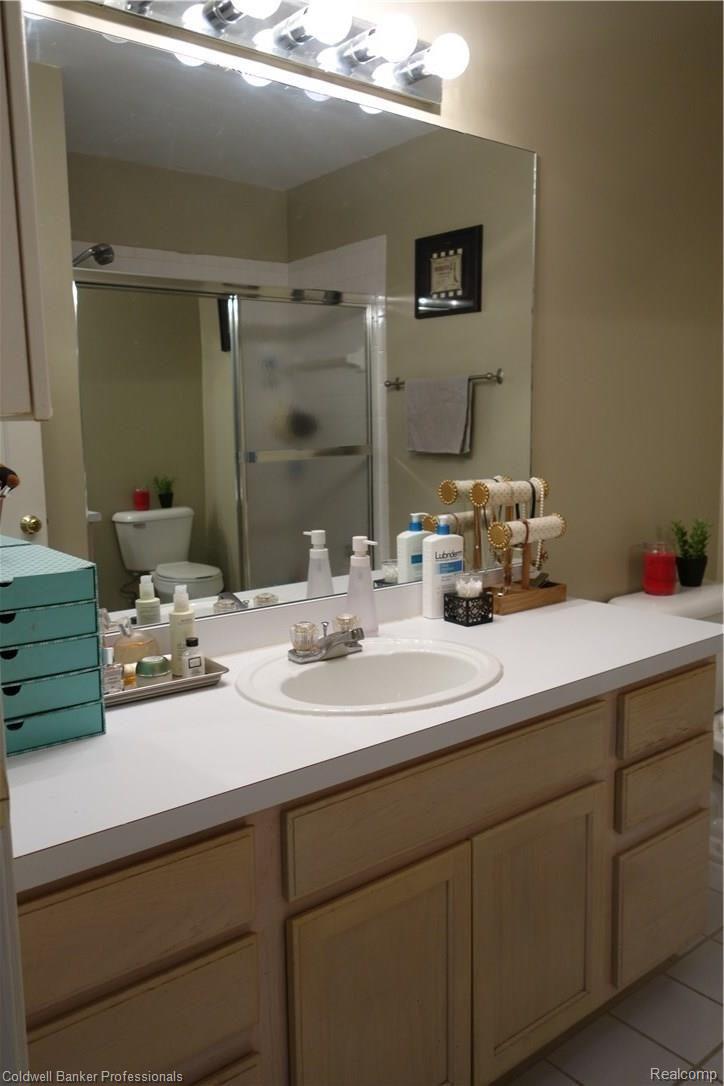 4941 South Crooks Road Royal Oak, MI 48073 - Photo 7 of 18 Plenty of counter space, storage and light in the bathroom