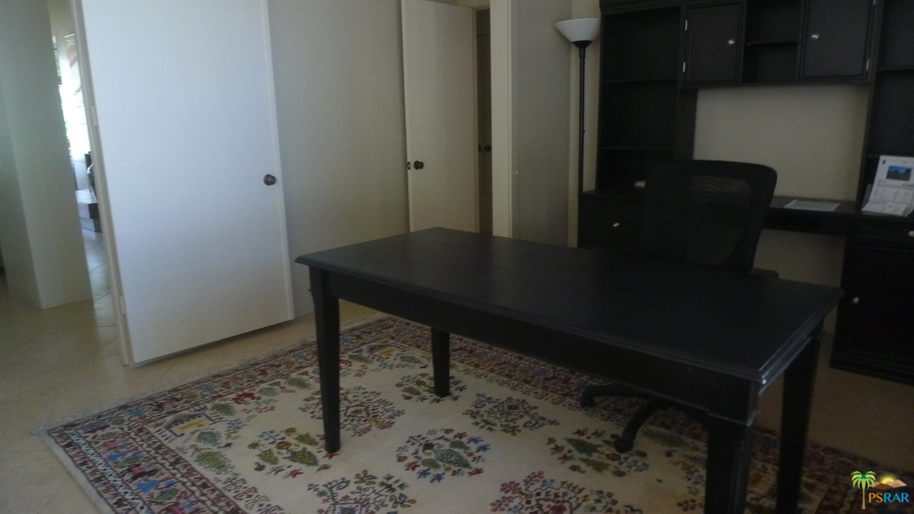 812 Inverness Drive Rancho Mirage, CA 92270 - Photo 23 of 28 a room with a table and chairs