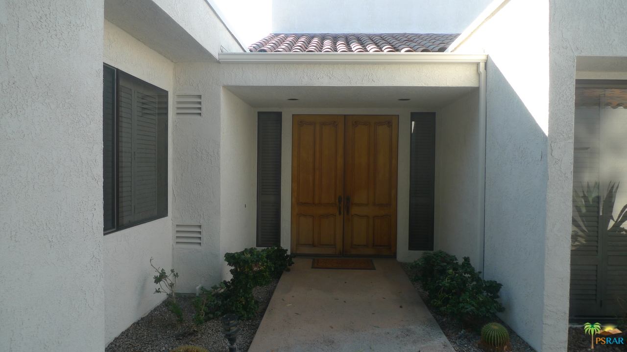 812 Inverness Drive Rancho Mirage, CA 92270 - Photo 4 of 28 a view of a entryway door of the house