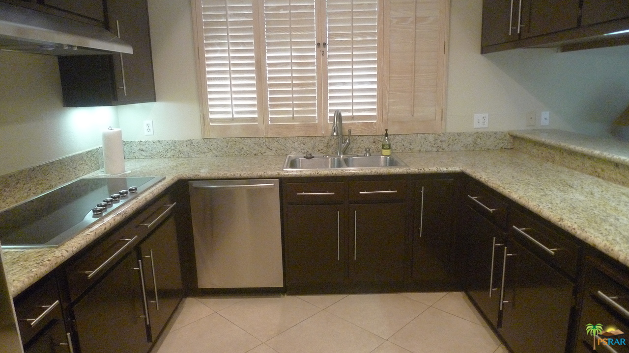 812 Inverness Drive Rancho Mirage, CA 92270 - Photo 9 of 28 a kitchen with a sink and a window