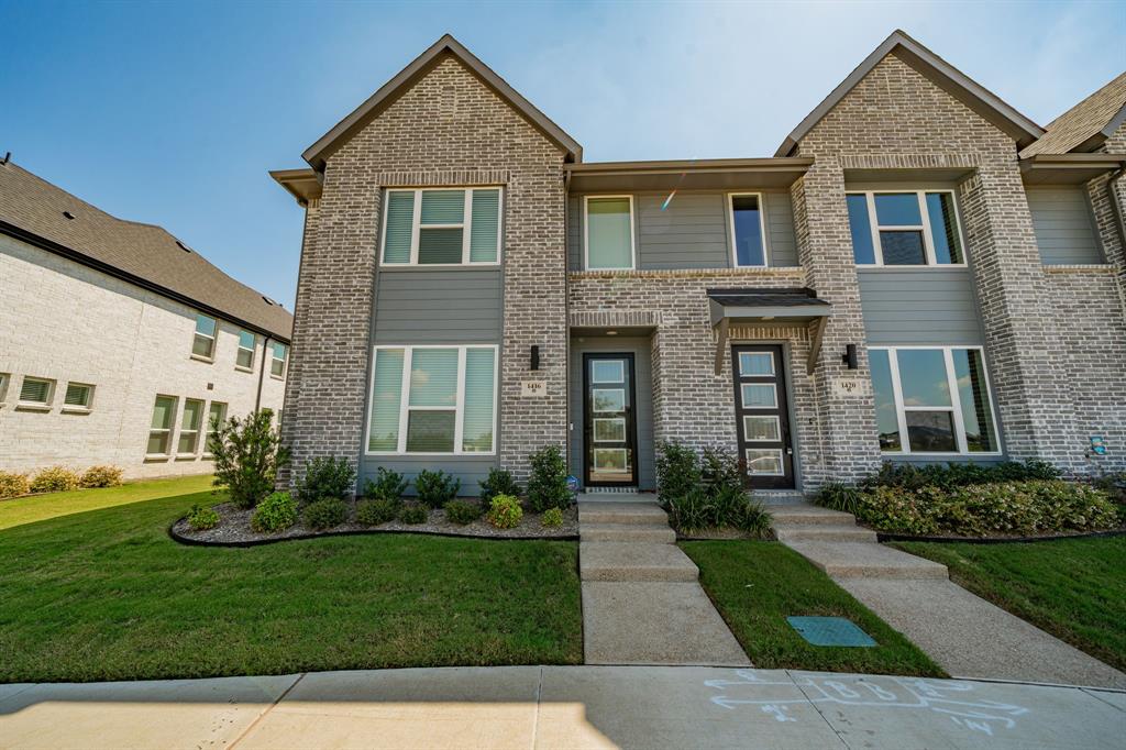 1416 Solterra Boulevard Mesquite, TX 75181 - Photo 1 of 32 a front view of a house with a yard