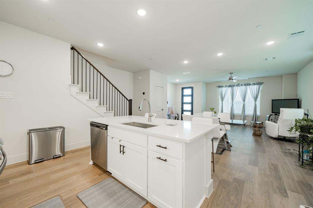 1416 Solterra Boulevard Mesquite, TX 75181 - Photo 31 of 32 a large white kitchen with a large window