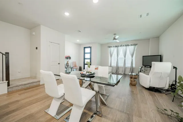 a room with cabinets and washer dryer