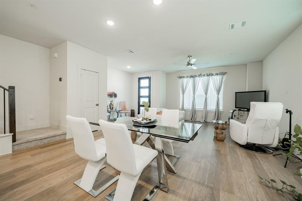 1416 Solterra Boulevard Mesquite, TX 75181 - Photo 16 of 32 a living room with furniture and wooden floor
