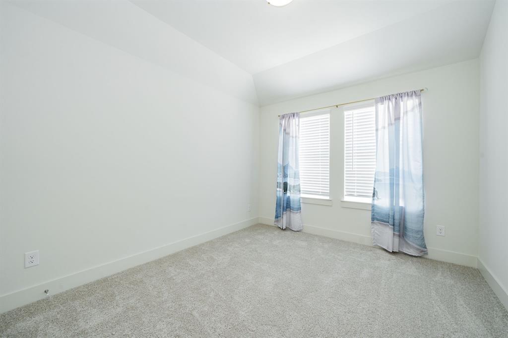 1416 Solterra Boulevard Mesquite, TX 75181 - Photo 28 of 32 an empty room with a empty space and a window