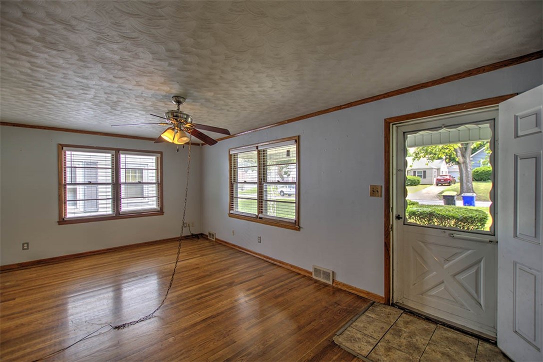 963 North University Avenue Decatur, IL 62522 - Photo 4 of 20 a view of an empty room with a window