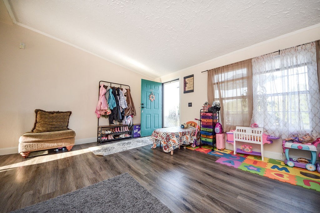 1261 Keith Valley Road Southeast Cleveland, TN 37323 - Photo 4 of 24 a room with toys and a wooden floor