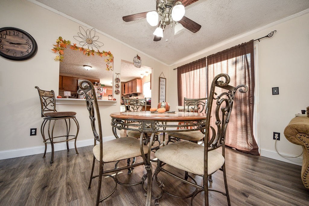 1261 Keith Valley Road Southeast Cleveland, TN 37323 - Photo 8 of 24 a view of a dining room with furniture window and wooden floor