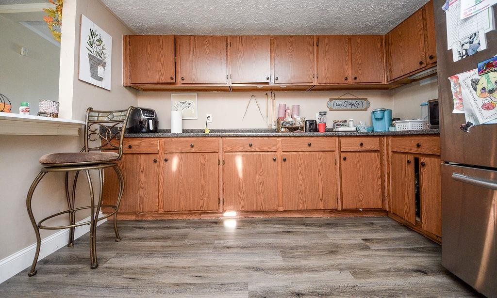 1261 Keith Valley Road Southeast Cleveland, TN 37323 - Photo 10 of 24 a kitchen with stainless steel appliances granite countertop a sink stove and cabinets