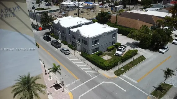 an aerial view of a house with outdoor space