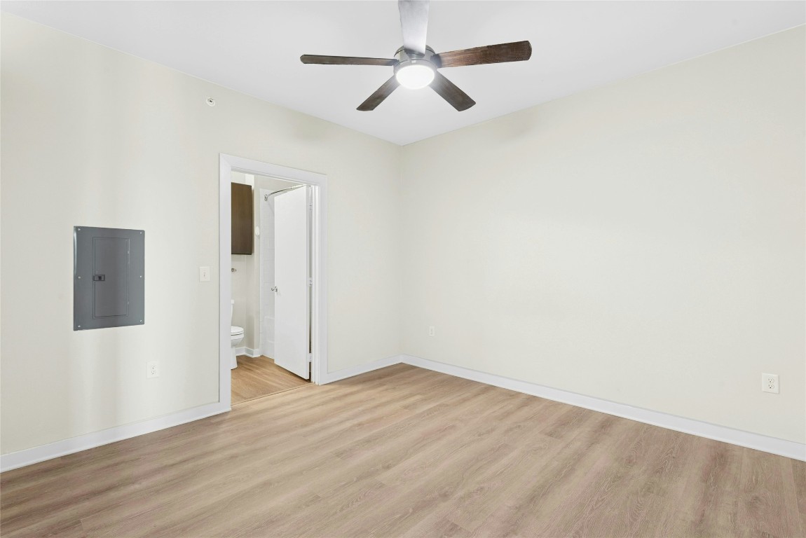 1900 Barton Springs Road, Unit 4004 Austin, TX 78704 - Photo 9 of 19 wooden floor in an empty room