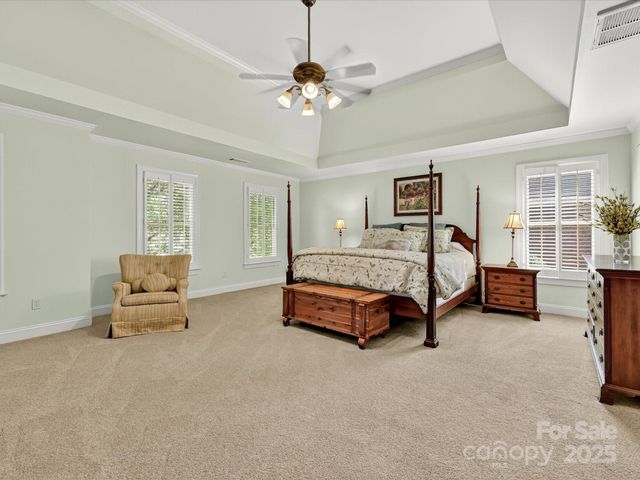 a bedroom with a bed and furniture