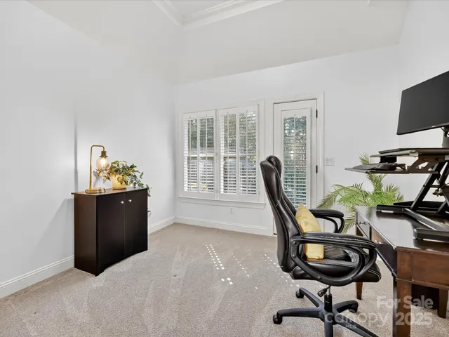 a room with furniture and a window